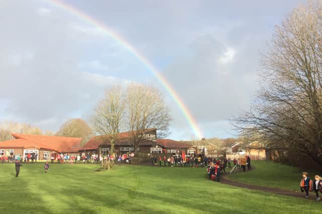 Red Barn Community Primary School with rainbow